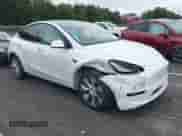 2022 Tesla Model Y Long Range z VIN 7SAYGDEE6NF317707, wystawiony jako IAAI lot #43186532 z przebiegiem 45 306 mil mil oraz . Historia ofert i sprzedaży dostępna na DreamBid. Obrazek 1.