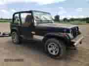 1992 Jeep Wrangler with VIN 2J4FY29S0NJ554857, listed as a Copart auction lot 64522985 with 245,263 mi miles and Clean title. Bid and sale history available at DreamBid. Image 4.