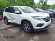 2016 Honda Pilot EX-L with VIN 5FNYF6H63GB072979, listed as a IAAI auction lot 42297910 with 155,869 mi miles and . Bid and sale history available at DreamBid. Image 1.