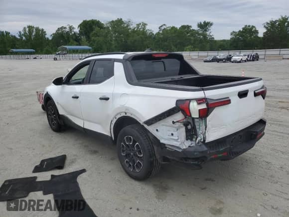 2022 Hyundai Santa Cruz SEL с VIN 5NTJC4AEXNH009586, выставлен на аукционе Copart как лот 57462115 с пробегом 71 759 миль миль и Списание • Salvage title. История ставок и продаж доступна на DreamBid. Изображение 2.