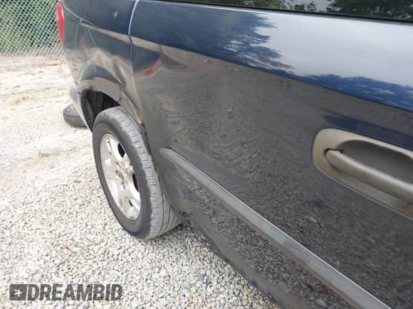 2003 Dodge Caravan SE z VIN 1D4GP25R13B244927, wystawiony jako IAAI lot #43105613 z przebiegiem 167 062 mil mil oraz . Historia ofert i sprzedaży dostępna na DreamBid. Obrazek 6.