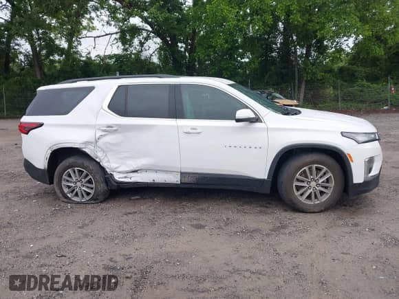 2023 Chevrolet Traverse LT Cloth z VIN 1GNERGKW2PJ325718, wystawiony jako IAAI lot #42370272 z przebiegiem 42 000 mil mil oraz . Historia ofert i sprzedaży dostępna na DreamBid. Obrazek 12.