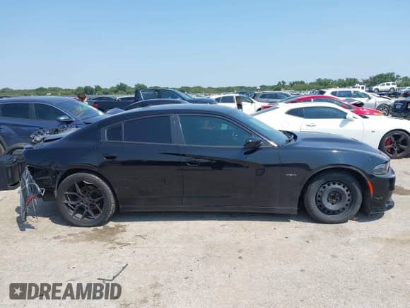 2018 Dodge Charger R/T with VIN 2C3CDXCT7JH209866, listed as a IAAI auction lot 43157349 with 163,502 mi miles and . Bid and sale history available at DreamBid. Image 13.