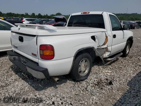 2002 GMC Sierra 1500 z VIN 1GTEC14W72Z334848, wystawiony jako Copart lot #59733325 z przebiegiem 213 155 mil mil oraz Szkoda całkowita • Salvage title. Historia ofert i sprzedaży dostępna na DreamBid. Obrazek 3.