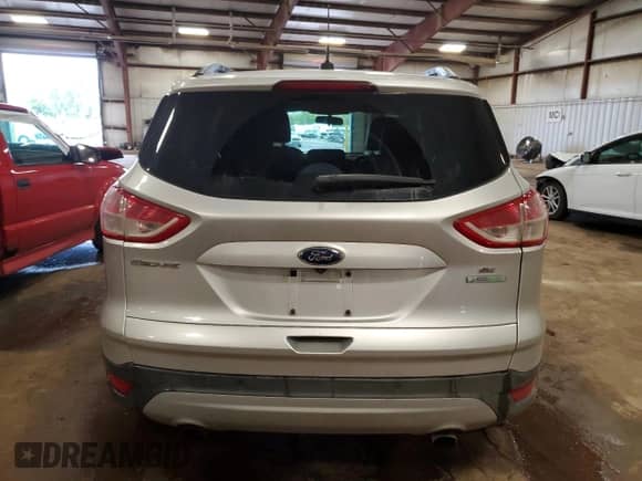 2014 Ford Escape SE с VIN 1FMCU0GX1EUD07872, выставлен на аукционе Copart как лот 85181305 с пробегом 120 714 миль миль и Чистый • Clean title. История ставок и продаж доступна на DreamBid. Изображение 6.