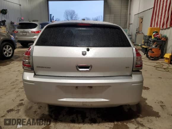 2005 Dodge Magnum RT с VIN 2D4GV58235H591613, выставлен на аукционе Copart как лот 86317214 с пробегом Не указан миль и Списание • Salvage title. История ставок и продаж доступна на DreamBid. Изображение 6.