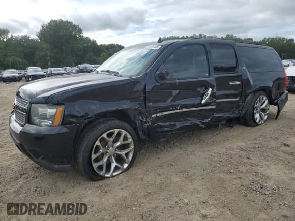 2014 Chevrolet Suburban LTZ с VIN 1GNSKKE7XER239070, выставлен на аукционе Copart как лот 85556165 с пробегом 186 343 миль миль и Чистый • Clean title. История ставок и продаж доступна на DreamBid. Изображение 1.