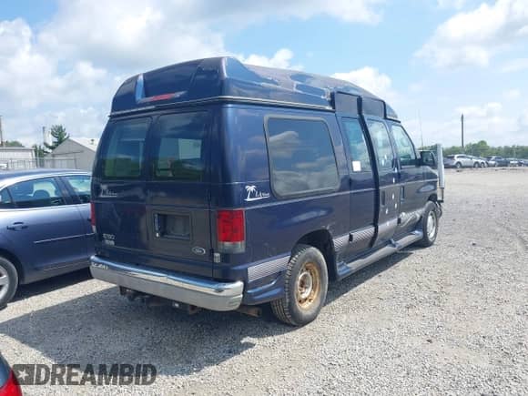 2002 Ford Econoline Cargo Recreational with VIN 1FDRE14W62HB28451, listed as a IAAI auction lot 42984132 with 99,232 mi miles and . Bid and sale history available at DreamBid. Image 4.