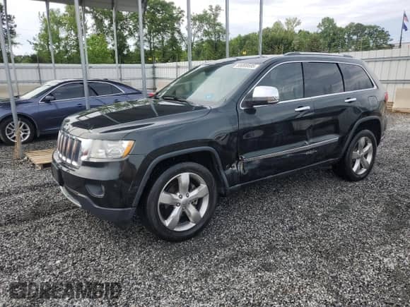 2012 Jeep Grand Cherokee Limited z VIN 1C4RJEBG5CC270873, wystawiony jako Copart lot #55069595 z przebiegiem 148 801 mil mil oraz Szkoda całkowita • Salvage title. Historia ofert i sprzedaży dostępna na DreamBid. Obrazek 1.