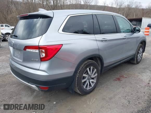 2021 Honda Pilot EX z VIN 5FNYF6H34MB029060, wystawiony jako IAAI lot #41719479 z przebiegiem 55 968 mil mil oraz . Historia ofert i sprzedaży dostępna na DreamBid. Obrazek 4.