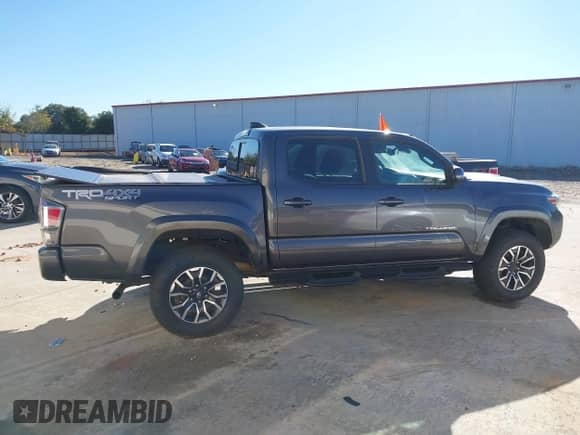 2023 Toyota Tacoma SR с VIN 3TYCZ5AN7PT109786, выставлен на аукционе IAAI как лот 42926073 с пробегом 51 321 миль миль и . История ставок и продаж доступна на DreamBid. Изображение 13.