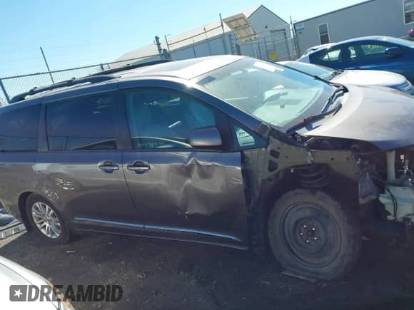 2013 Toyota Sienna XLE AAS with VIN 5TDYK3DC2DS388953, listed as a IAAI auction lot 43425263 with 142,652 mi miles and . Bid and sale history available at DreamBid. Image 14.