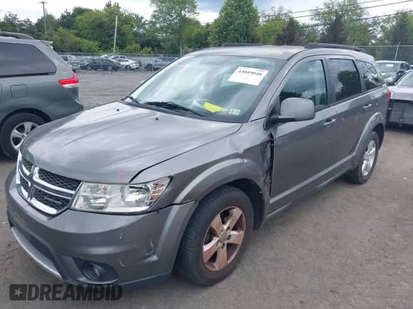 2012 Dodge Journey SXT z VIN 3C4PDDBG1CT213809, wystawiony jako IAAI lot #43049048 z przebiegiem 178 647 mil mil oraz . Historia ofert i sprzedaży dostępna na DreamBid. Obrazek 2.