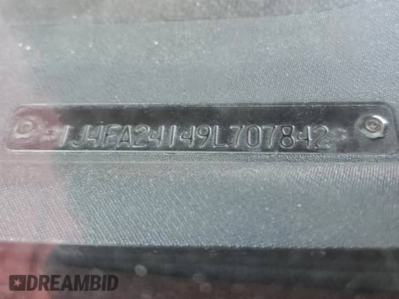 2009 Jeep Wrangler X with VIN 1J4FA24149L707842, listed as a Copart auction lot 85186375 with 142,001 mi miles and Clean title. Bid and sale history available at DreamBid. Image 12.