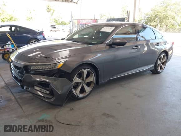 2019 Honda Accord Touring z VIN 1HGCV2F93KA005272, wystawiony jako IAAI lot #43151745 z przebiegiem 53 581 mil mil oraz . Historia ofert i sprzedaży dostępna na DreamBid. Obrazek 17.