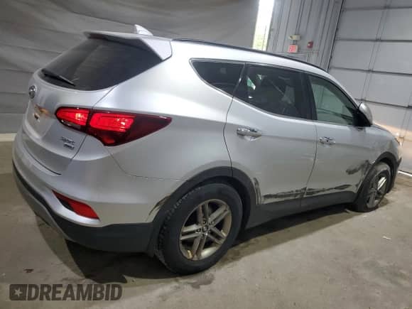 2018 Hyundai Santa Fe 2.4L with VIN 5XYZUDLB8JG513251, listed as a Copart auction lot 67894765 with 107,030 mi miles and Salvage title. Bid and sale history available at DreamBid. Image 3.