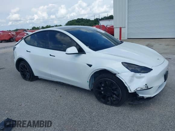 2022 Tesla Model Y Long Range z VIN 7SAYGDEE1NF385915, wystawiony jako IAAI lot #42458295 z przebiegiem 68 345 mil mil oraz . Historia ofert i sprzedaży dostępna na DreamBid. Obrazek 1.