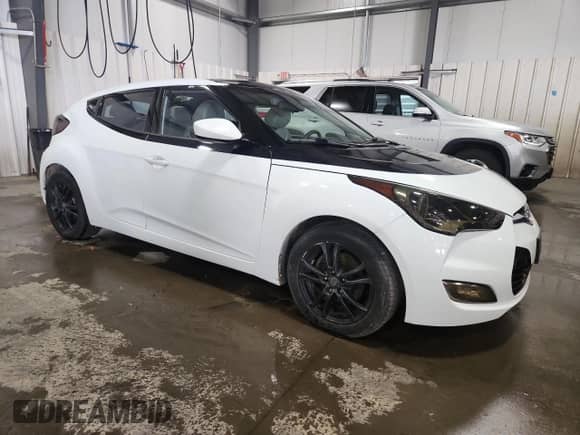2012 Hyundai Veloster w/Gray Int z VIN KMHTC6AD2CU028769, wystawiony jako Copart lot #70858065 z przebiegiem 165 208 mil mil oraz Szkoda całkowita • Salvage title. Historia ofert i sprzedaży dostępna na DreamBid. Obrazek 4.