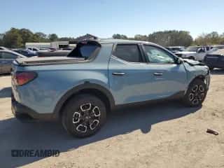 2024 Hyundai Santa Cruz SEL с VIN 5NTJBDDE8RH104510, выставлен на аукционе Copart как лот 77585554 с пробегом 10 848 миль миль и Списание • Salvage title. История ставок и продаж доступна на DreamBid. Изображение 3.
