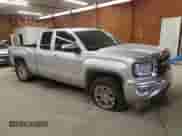 2018 GMC Sierra 1500 SLE с VIN 1GTV2MEC1JZ245395, выставлен на аукционе Copart как лот 70380975 с пробегом 89 845 миль миль и Списание • Salvage title. История ставок и продаж доступна на DreamBid. Изображение 4.