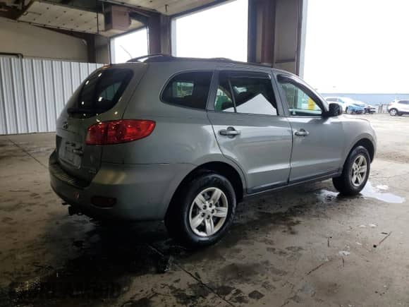 2009 Hyundai Santa Fe GLS z VIN 5NMSG73D79H238226, wystawiony jako Copart lot #85499485 z przebiegiem 238 607 mil mil oraz Szkoda całkowita • Salvage title. Historia ofert i sprzedaży dostępna na DreamBid. Obrazek 3.