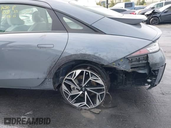 2024 Hyundai Ioniq 6 SEL with VIN KMHM34AA8RA061977, listed as a IAAI auction lot 41851674 with 8,907 mi miles and . Bid and sale history available at DreamBid. Image 6.