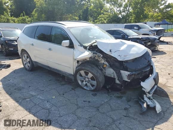 2015 Chevrolet Traverse LTZ с VIN 1GNKVJKD9FJ229190, выставлен на аукционе Copart как лот 65802925 с пробегом Не указан миль и Списание • Salvage title. История ставок и продаж доступна на DreamBid. Изображение 4.