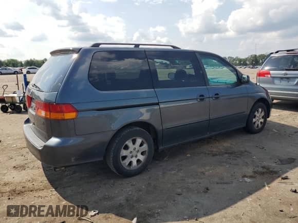 2004 Honda Odyssey EX с VIN 5FNRL18694B086512, выставлен на аукционе Copart как лот 64595775 с пробегом 175 144 миль миль и Списание • Salvage title. История ставок и продаж доступна на DreamBid. Изображение 3.