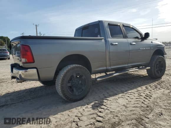 2011 Ram 1500 Big Horn with VIN 1D7RB1GT6BS515329, listed as a Copart auction lot 69392895 with 165,902 mi miles and Salvage title. Bid and sale history available at DreamBid. Image 3.