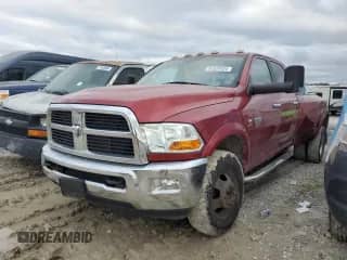 2010 Dodge 3500 Laramie with VIN 3D73Y4CL7AG141055, listed as a Copart auction lot 81928424 with 340,032 mi miles and Salvage title. Bid and sale history available at DreamBid. Image 1.