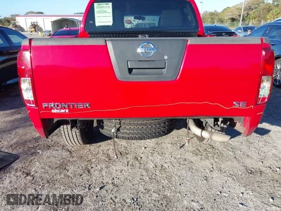 2009 Nissan Frontier SE with VIN 1N6AD07U19C419811, listed as a IAAI auction lot 41090904 with 141,119 mi miles and . Bid and sale history available at DreamBid. Image 6.