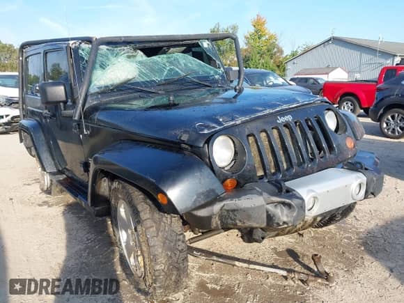 2011 Jeep Wrangler Sahara with VIN 1J4AA5D10BL511947, listed as a IAAI auction lot 43227627 with 168,984 mi miles and . Bid and sale history available at DreamBid. Image 1.