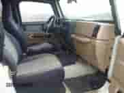 1999 Jeep Wrangler SE with VIN 1J4FY29P2XP461923, listed as a IAAI auction lot 43591392 with 198,022 mi miles and . Bid and sale history available at DreamBid. Image 5.