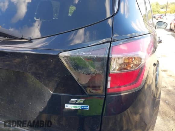 2017 Ford Escape SE with VIN 1FMCU9GD0HUA12356, listed as a IAAI auction lot 43304524 with 104,565 mi miles and . Bid and sale history available at DreamBid. Image 6.