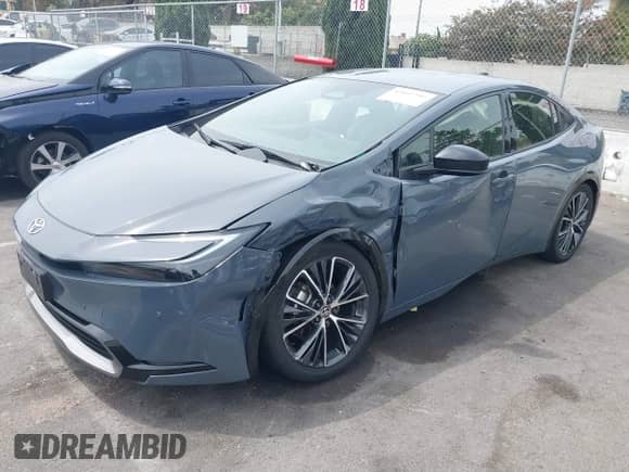 2023 Toyota Prius LE with VIN JTDACAAU6P3006154, listed as a IAAI auction lot 43107392 with 143,761 mi miles and . Bid and sale history available at DreamBid. Image 17.