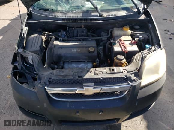 2008 Chevrolet Aveo LS z VIN KL1TD56628B235176, wystawiony jako Copart lot #80442984 z przebiegiem Nie podano mil oraz Nie do naprawy • Non repairable. Historia ofert i sprzedaży dostępna na DreamBid. Obrazek 12.