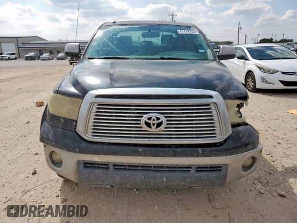 2012 Toyota Tundra Limited z VIN 5TFFY5F10CX128010, wystawiony jako Copart lot #71779725 z przebiegiem 309 990 mil mil oraz Szkoda całkowita • Salvage title. Historia ofert i sprzedaży dostępna na DreamBid. Obrazek 5.