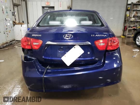 2010 Hyundai Elantra Blue z VIN KMHDU4AD4AU905720, wystawiony jako Copart lot #86271924 z przebiegiem 141 580 mil mil oraz Szkoda całkowita • Salvage title. Historia ofert i sprzedaży dostępna na DreamBid. Obrazek 6.
