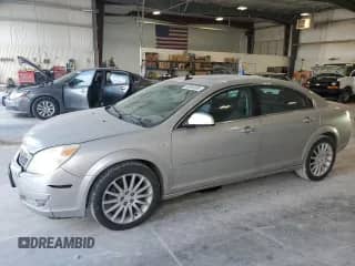 2007 Saturn Aura XR with VIN 1G8ZV577X7F271769, listed as a Copart auction lot 85094955 with 128,077 mi miles and Salvage title. Bid and sale history available at DreamBid. Image 1.
