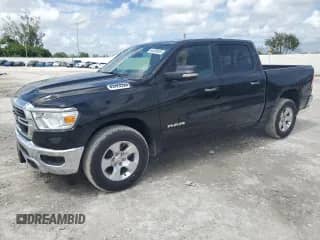 2020 Ram 1500 Big Horn with VIN 1C6RREFG2LN405483, listed as a Copart auction lot 64309925 with 6,587 mi miles and Salvage title. Bid and sale history available at DreamBid. Image 1.