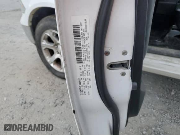 2014 Ram 1500 Laramie z VIN 1C6RR7VM9ES272891, wystawiony jako Copart lot #47981805 z przebiegiem Nie podano mil oraz Szkoda całkowita • Salvage title. Historia ofert i sprzedaży dostępna na DreamBid. Obrazek 12.