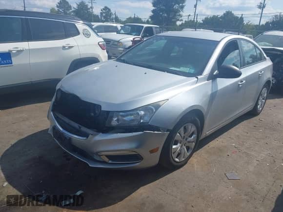 2015 Chevrolet Cruze LS with VIN 1G1PA5SG5F7241497, listed as a IAAI auction lot 43240717 with 124,642 mi miles and . Bid and sale history available at DreamBid. Image 2.