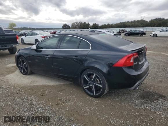 2015 Volvo S60 T6 R-Design Platinum с VIN YV1902TS1F2358022, выставлен на аукционе Copart как лот 84637315 с пробегом 163 076 миль миль и Списание • Salvage title. История ставок и продаж доступна на DreamBid. Изображение 2.