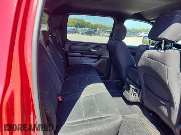 2025 Ram 1500 Tradesman with VIN 1C6RREGG5SN603844, listed as a Copart auction lot 82056605 with 20,679 mi miles and Salvage title. Bid and sale history available at DreamBid. Image 10.