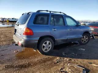 2002 Hyundai Santa Fe GLS с VIN KM8SC73D72U313822, выставлен на аукционе Copart как лот 79946994 с пробегом 239 734 миль миль и Списание • Salvage title. История ставок и продаж доступна на DreamBid. Изображение 3.