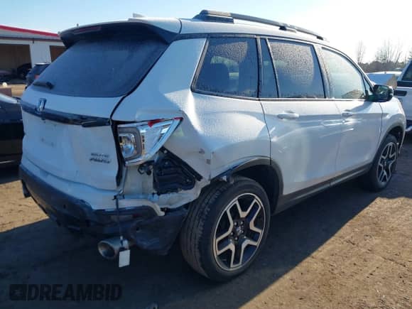 2023 Honda Passport Elite z VIN 5FNYF8H05PB005081, wystawiony jako IAAI lot #41698186 z przebiegiem 31 853 mil mil oraz . Historia ofert i sprzedaży dostępna na DreamBid. Obrazek 4.
