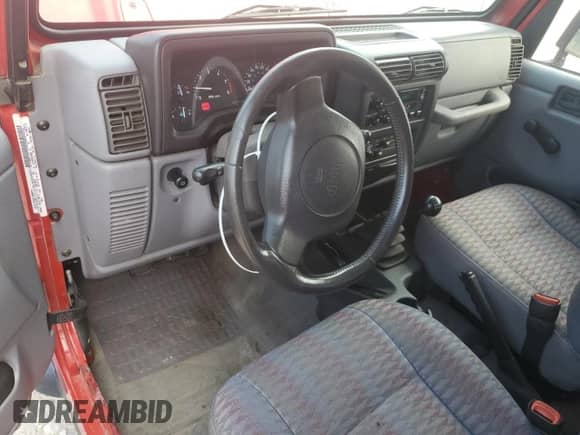 1998 Jeep Wrangler SE with VIN 1J4FY29P9WP736055, listed as a Copart auction lot 66898815 with 84,686 mi miles and Clean title. Bid and sale history available at DreamBid. Image 8.