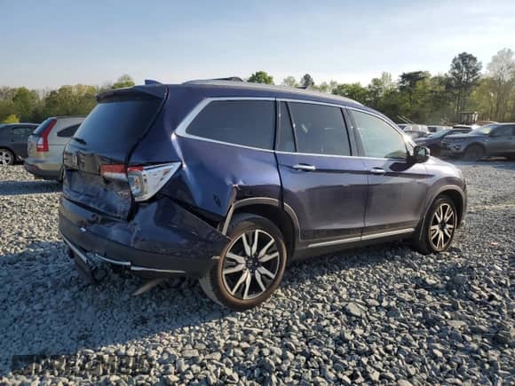 2022 Honda Pilot Touring 7-Passenger with VIN 5FNYF5H64NB017528, listed as a Copart auction lot 53305405 with 64,651 mi miles and Salvage title. Bid and sale history available at DreamBid. Image 3.