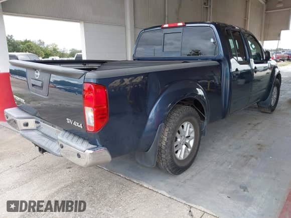2015 Nissan Frontier SV with VIN 1N6AD0FV1FN742136, listed as a IAAI auction lot 43330683 with 130,630 mi miles and . Bid and sale history available at DreamBid. Image 4.