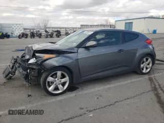 2014 Hyundai Veloster z VIN KMHTC6AD8EU194443, wystawiony jako Copart lot #60059565 z przebiegiem 201 848 mil mil oraz Szkoda całkowita • Salvage title. Historia ofert i sprzedaży dostępna na DreamBid. Obrazek 1.